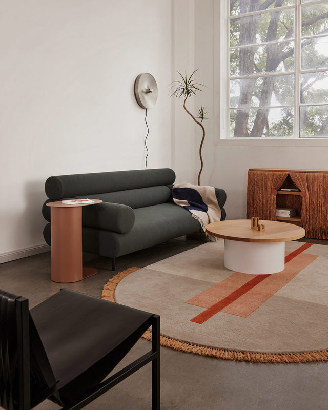 Cabin Lounge in Kvadrat Mosaic 972, Pillar Side Table in Nutmeg, Overlay Rug in Arch Peach, Weaver Cabinet in Copper, Dial Round Low Coffee Table | Design By Them