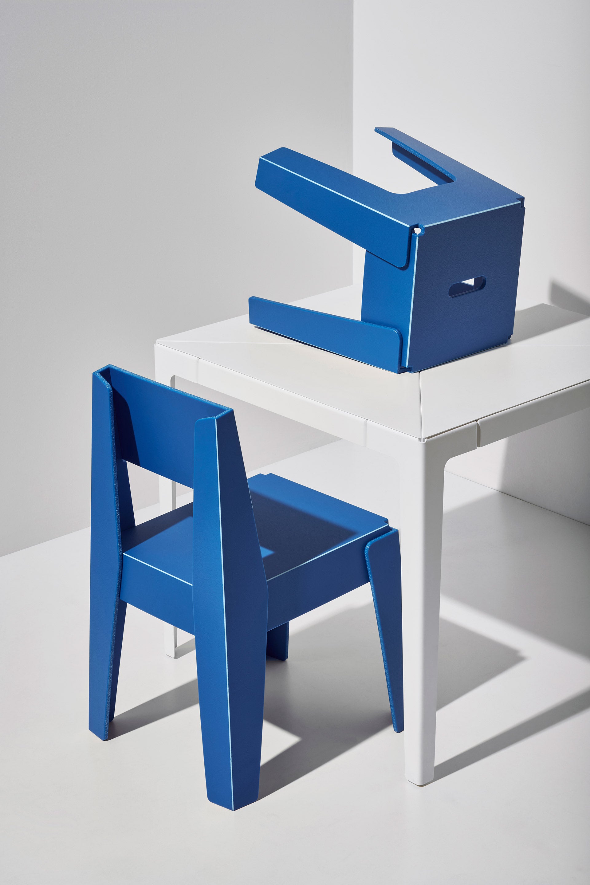 Blue Butter Chair and Stool | 80% Recycled Plastic Indoor Outdoor Furniture | Nicholas Karlovasitis & Sarah Gibson | DesignByThem