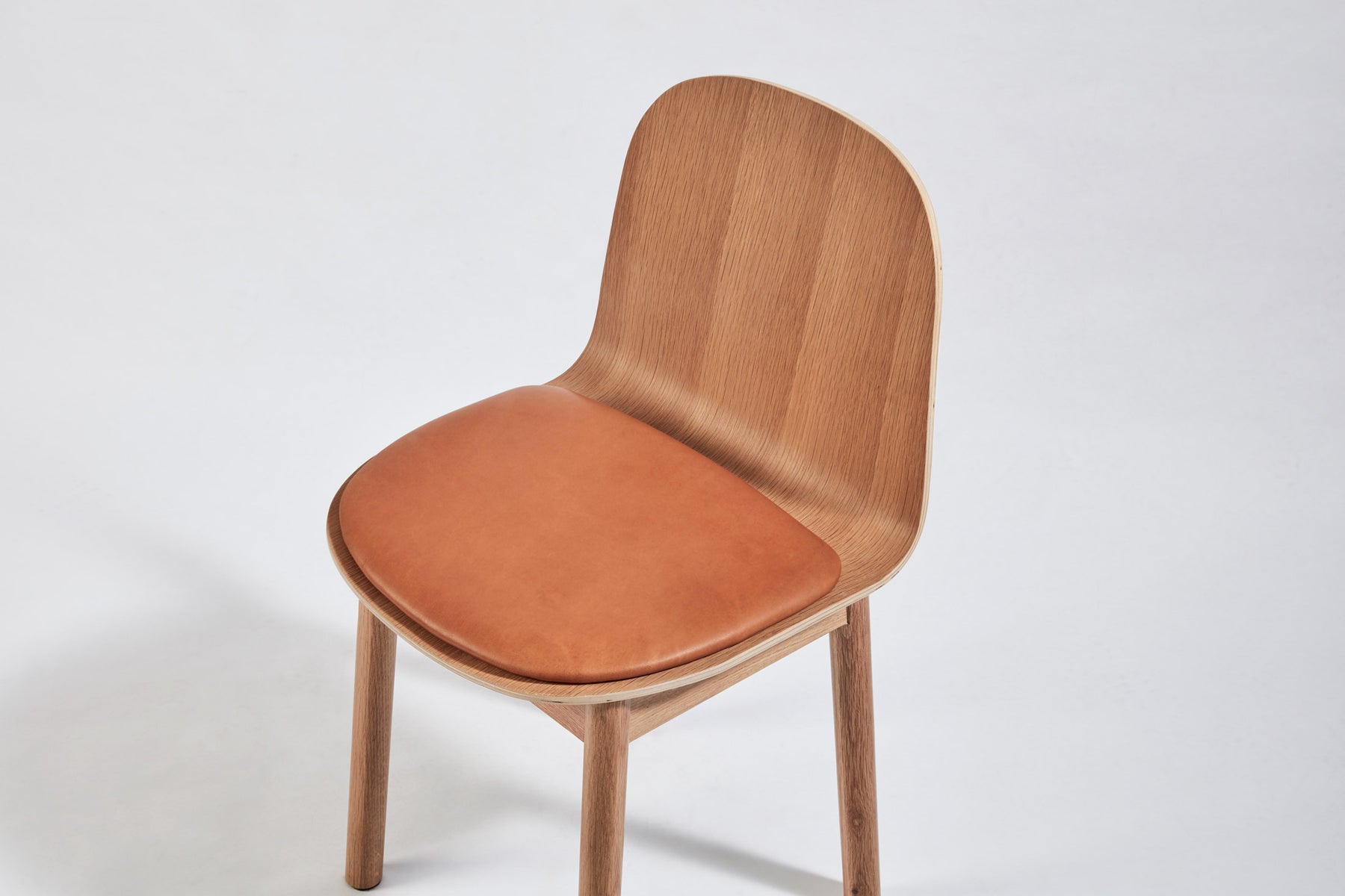 Potato Chair | Stacking Sled Timber & Upholstered Dining Office Chair with Handle | GibsonKarlo | DesignByThem | Gallery